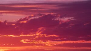 A vivid pink and orange sunset