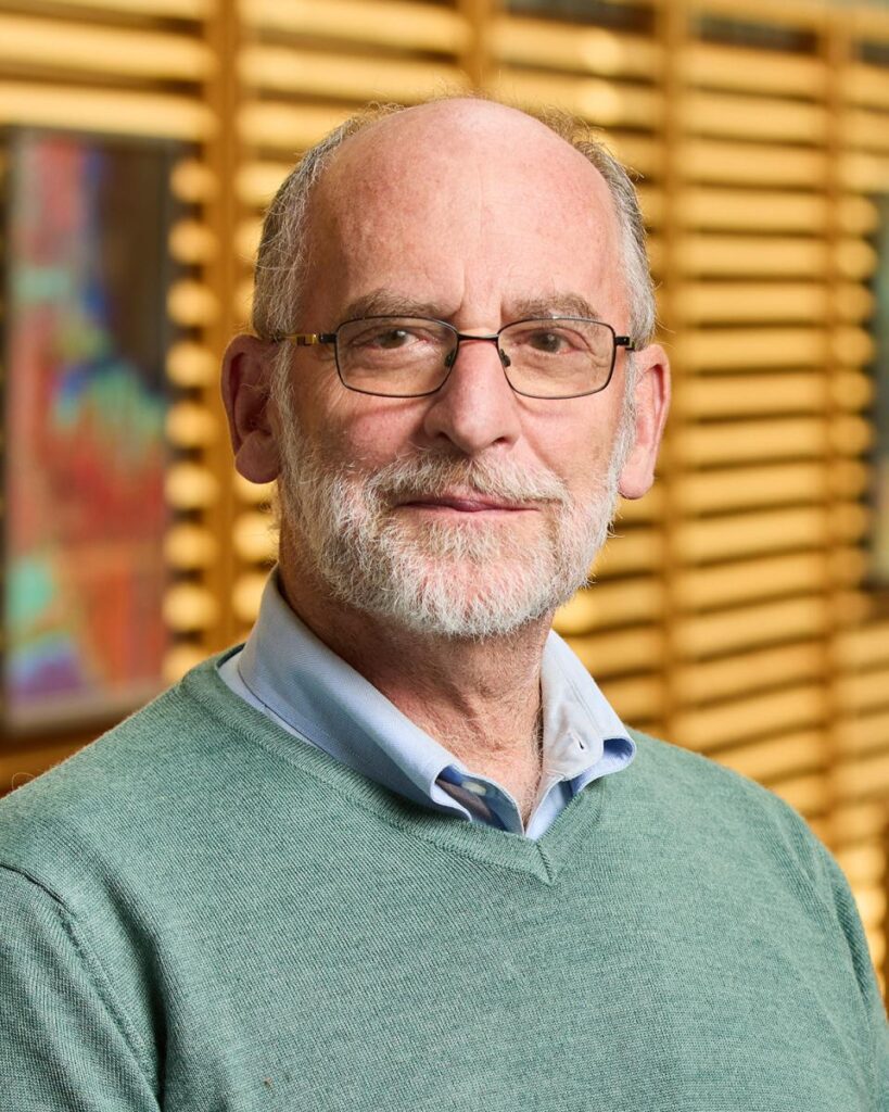 headshot of professor mendelsohn, an older white man wearing wire-rimmed glasses and a close-cropped beard