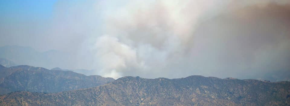 Smoke over hills in Los Angeles County in January 2025.