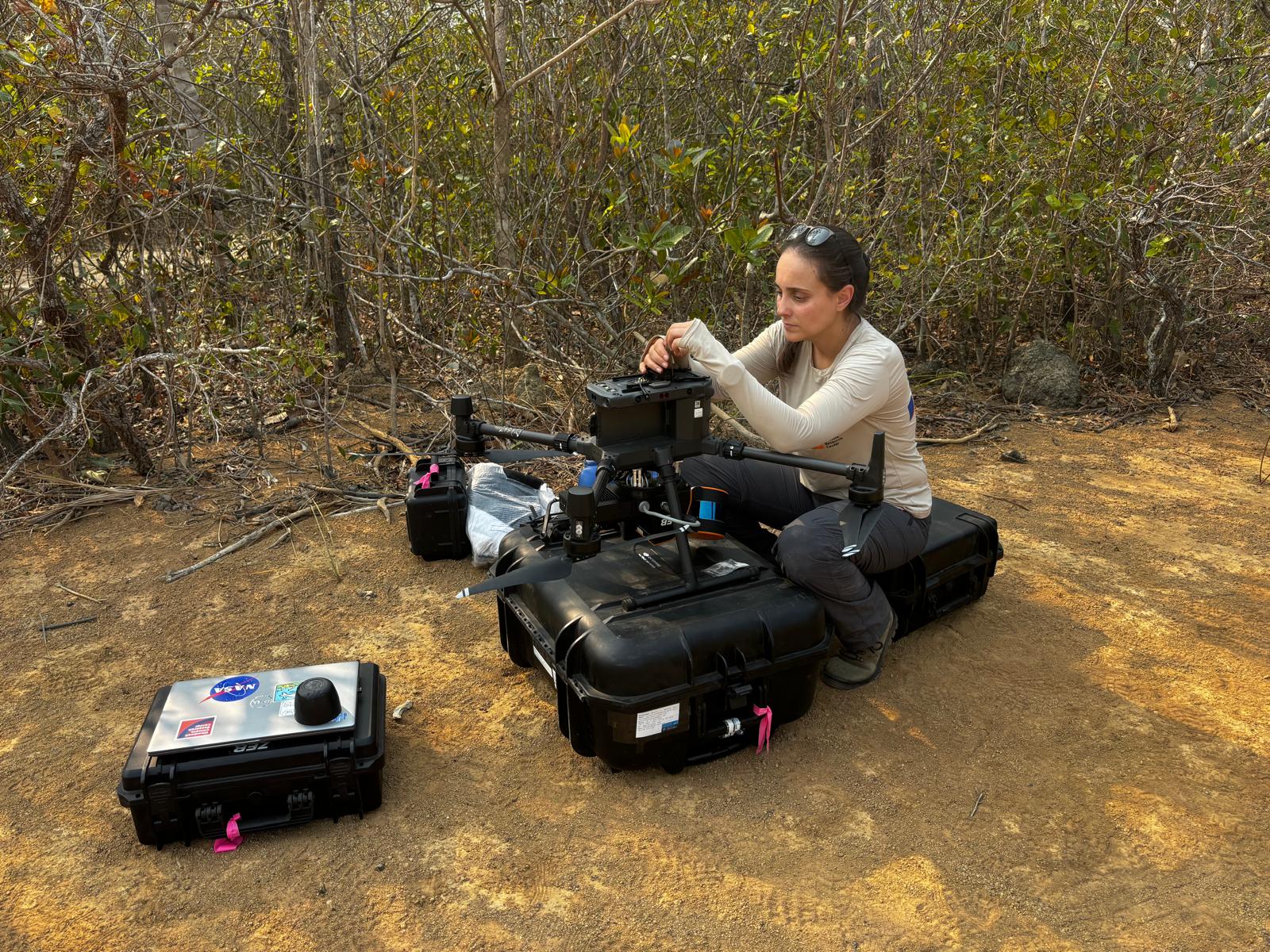 Manu checks out drone equipment pre flight