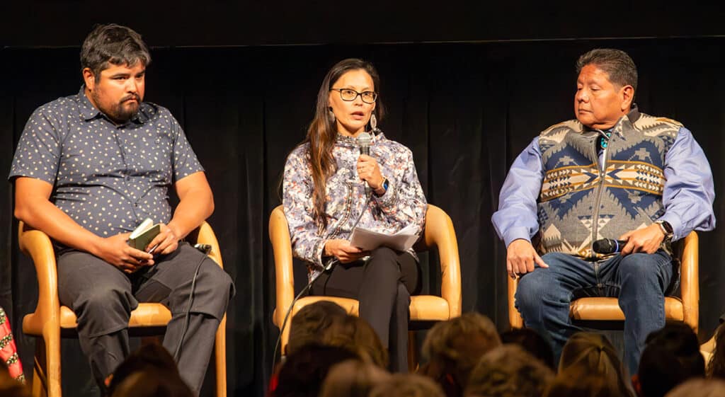 Brooke Woods speaking on a panel at Mountainfilm.