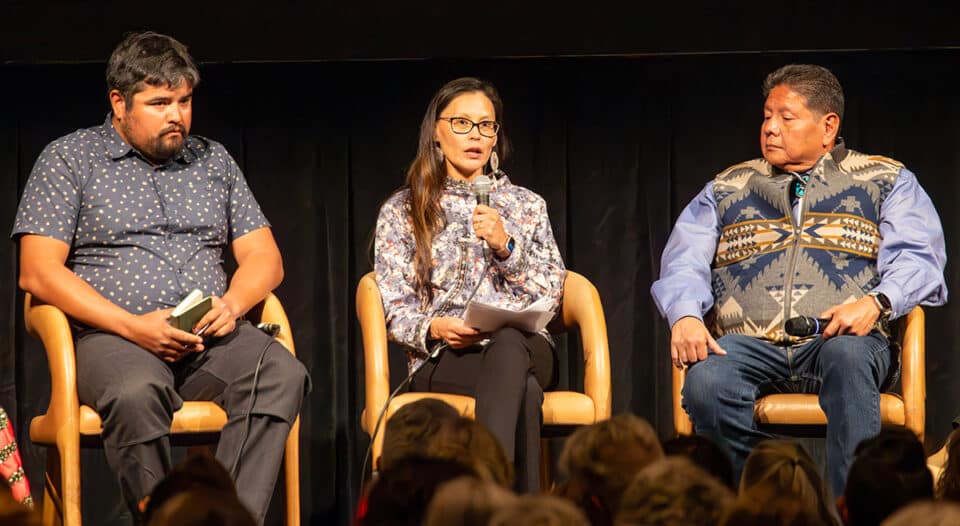 Brooke Woods speaking on a panel at Mountainfilm.