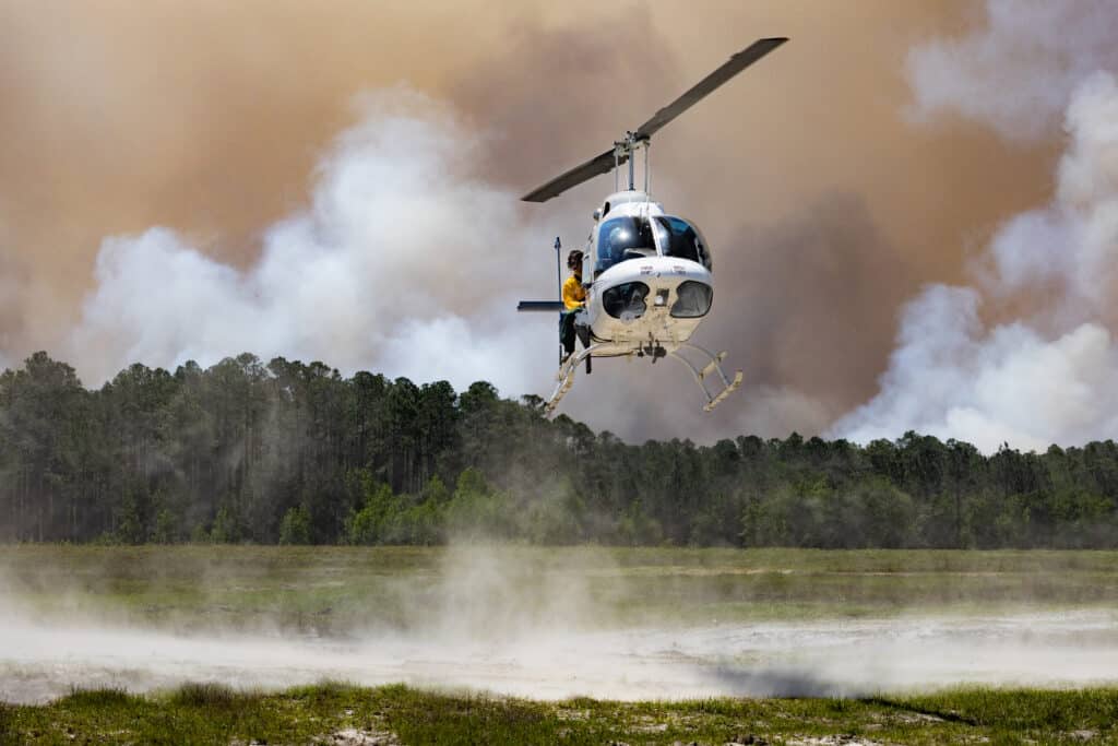 The ignition helicopter comes in for a landing during the April 2025 NASA FireSense-led research campaign at Fort Stewart-Hunter Army Airfield in Georgia.
