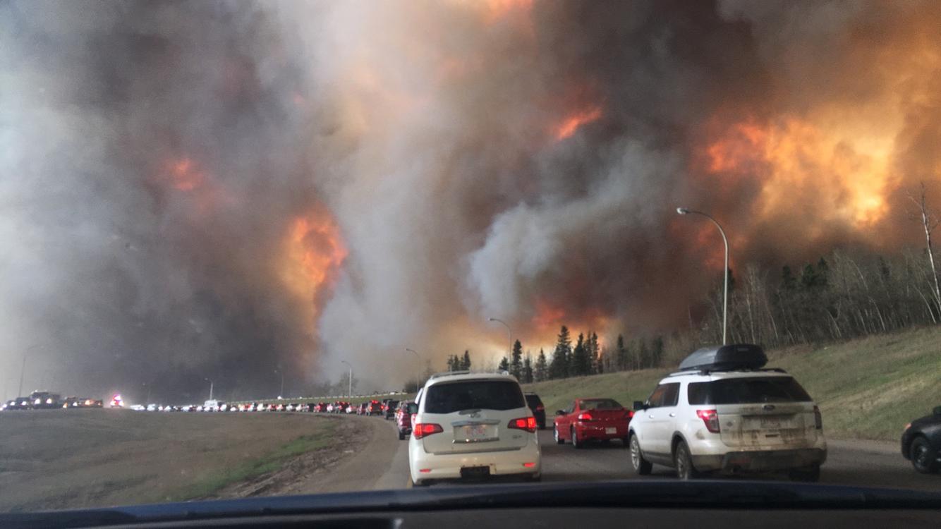 Wildfire near Highway 63 in Alberta, Canada. Photo by Darren R.D.