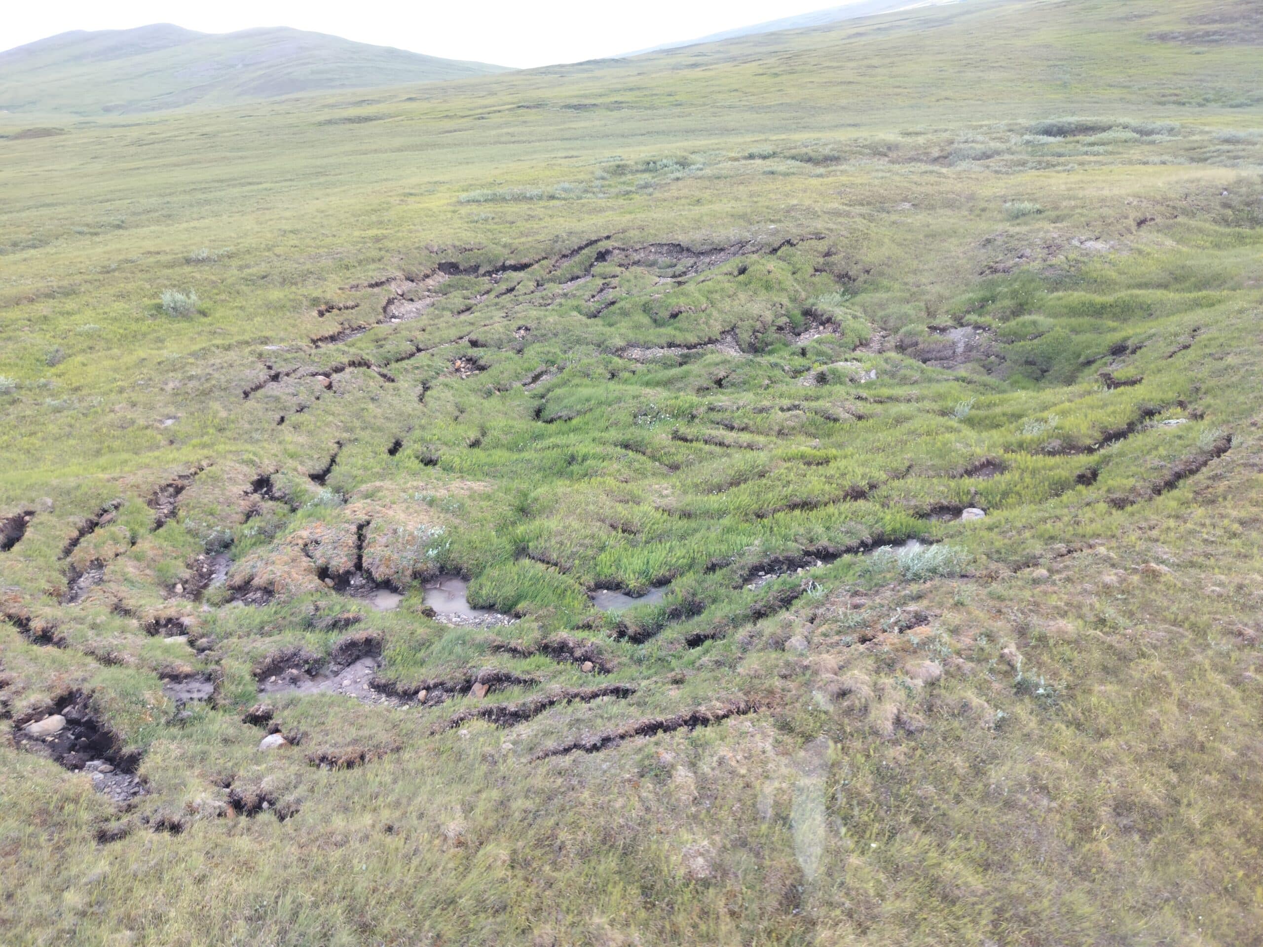slumping ground eroding on tundra