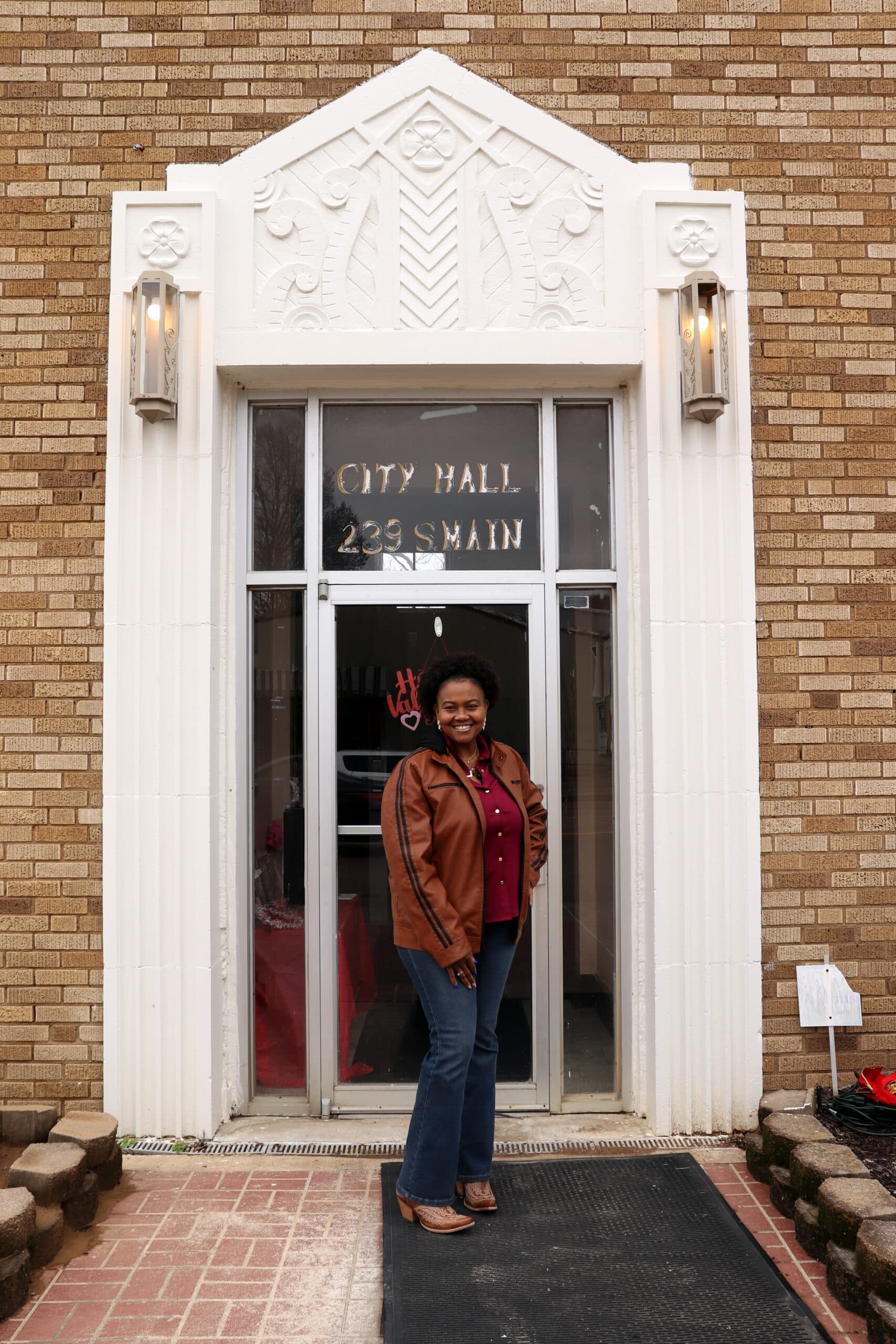 Mayor Tomeka Butler standing in front of city hall