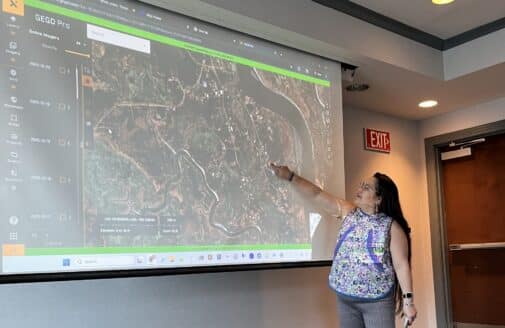 Lucy Martin sharing Typhoon Halong’s impact on her community. Photo by Greg Fiske / Woodwell Climate Research Center