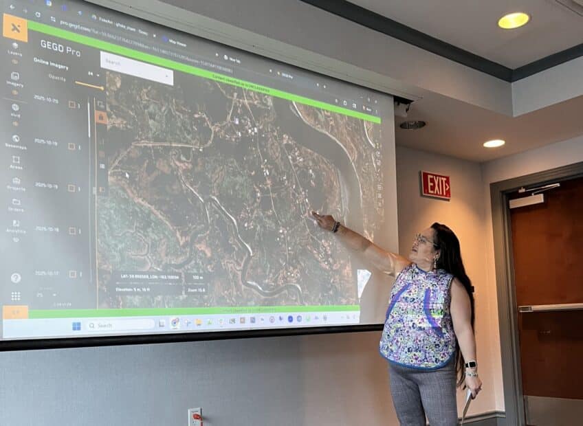 Lucy Martin sharing Typhoon Halong’s impact on her community. Photo by Greg Fiske / Woodwell Climate Research Center
