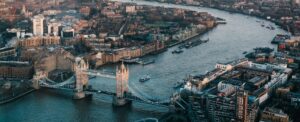 aerial photo of the london city skyline with a river running through it
