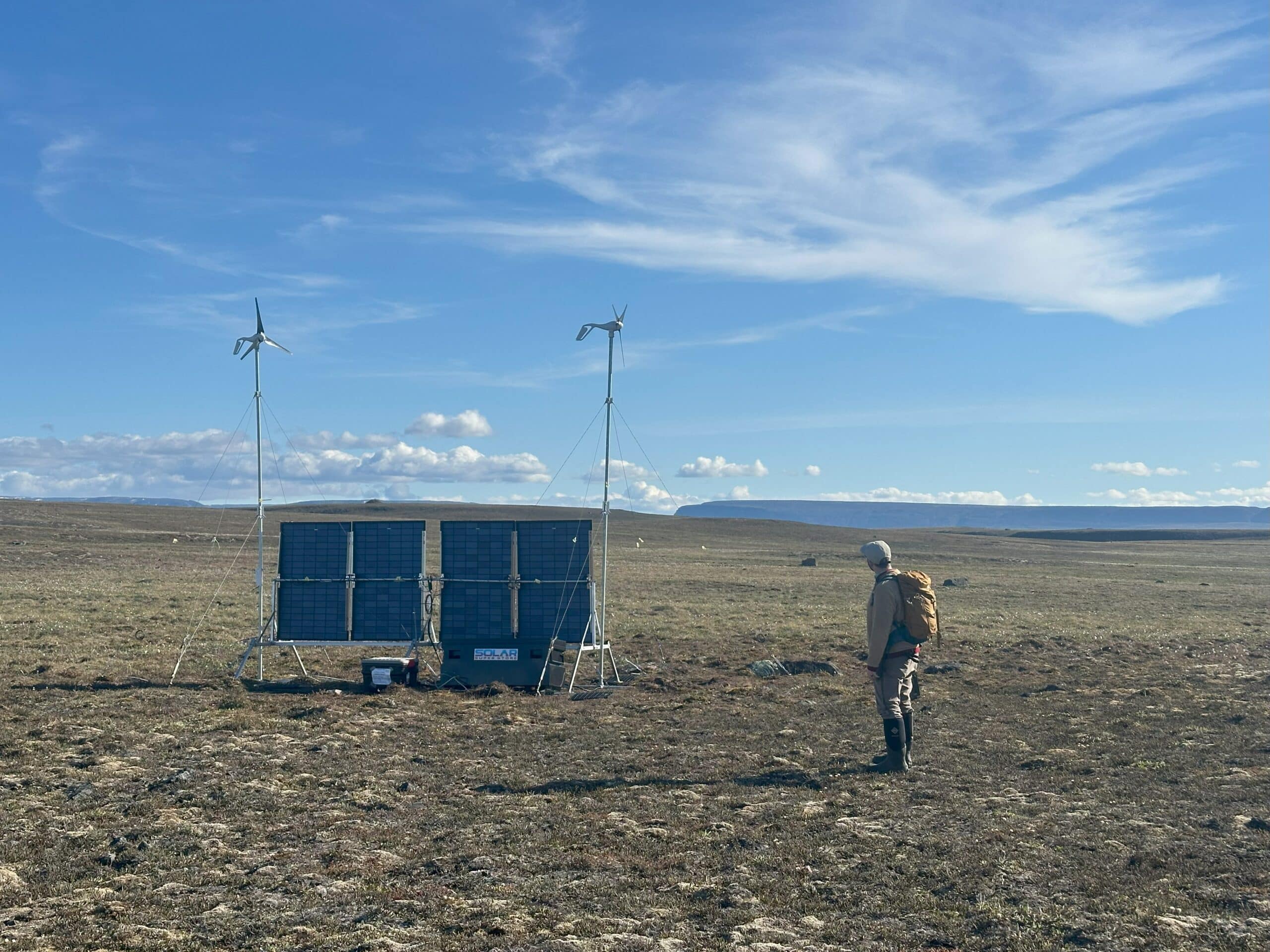 Patrick Murphy assessing the power structure at the Permafrost Pathways eddy covariance site in Mittimatalik (Pond Inlet), Nunavut July 2025